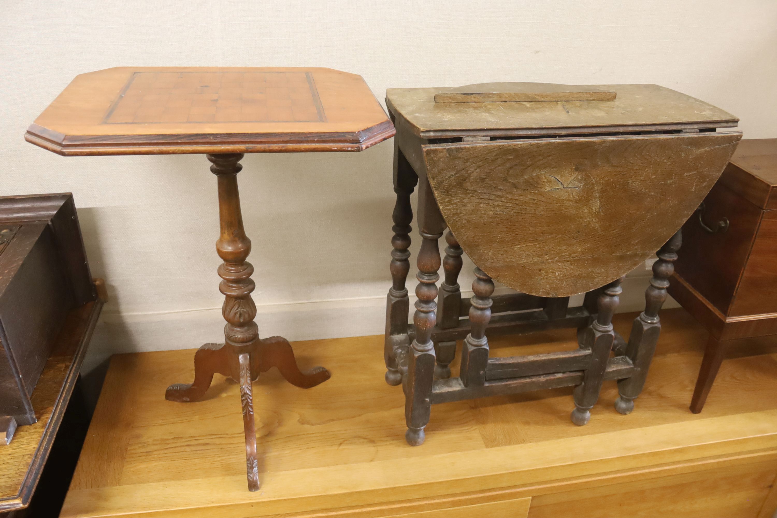 A small 18th century style oak gateleg table, width 60cm, depth 30cm, height 69cm together with a walnut tripod games table